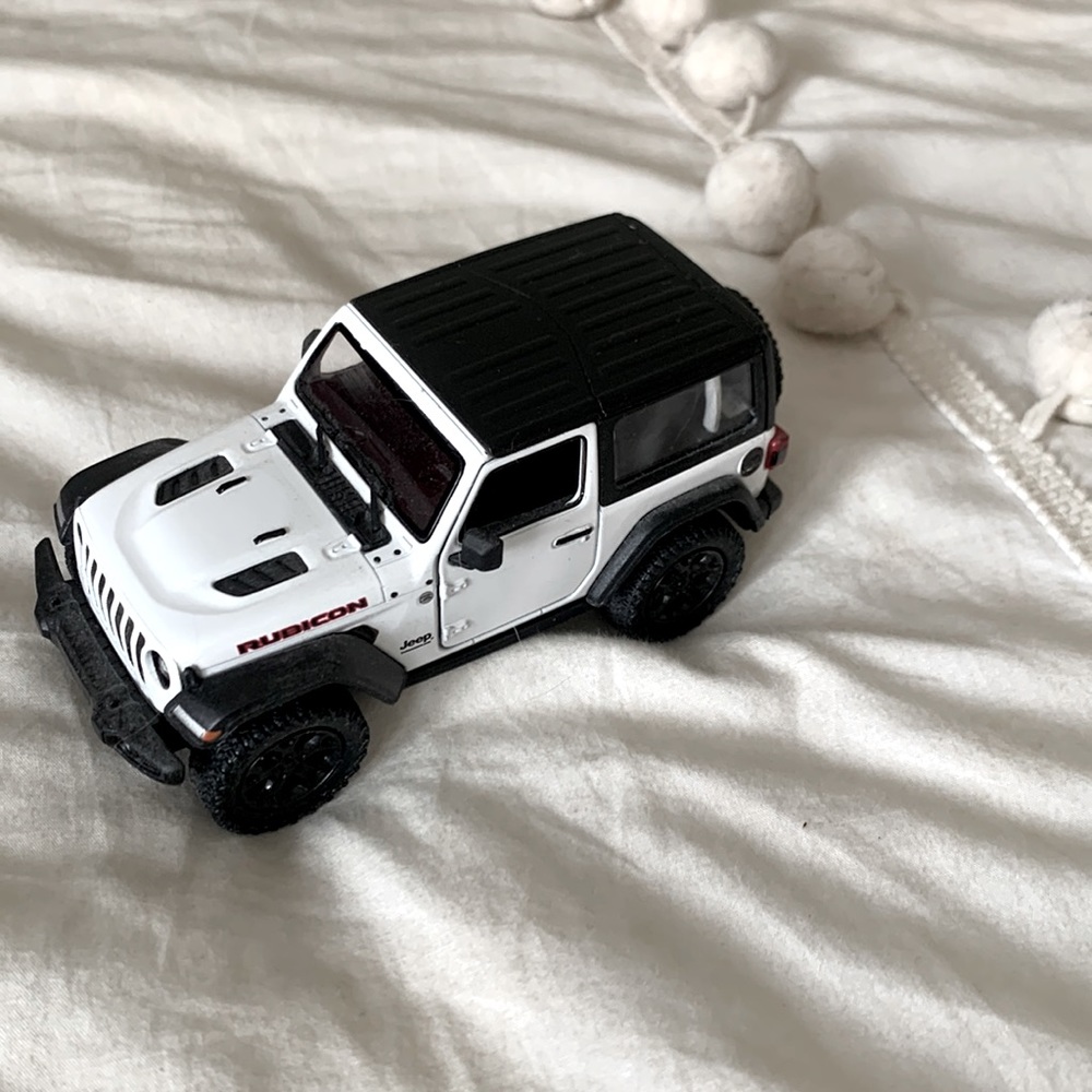 White Jeep toy car
